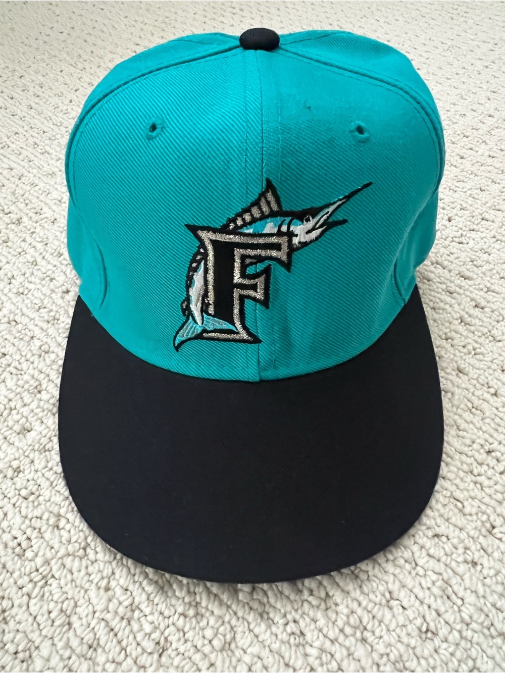 Turquoise and Black Baseball Cap with Marlin F Logo